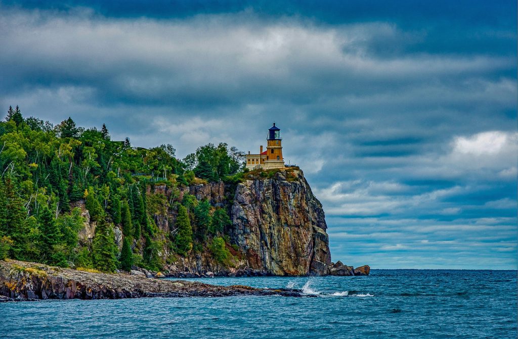 lighthouse, cliff, sea